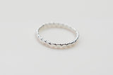 Our simple silver flat ball stacking ring