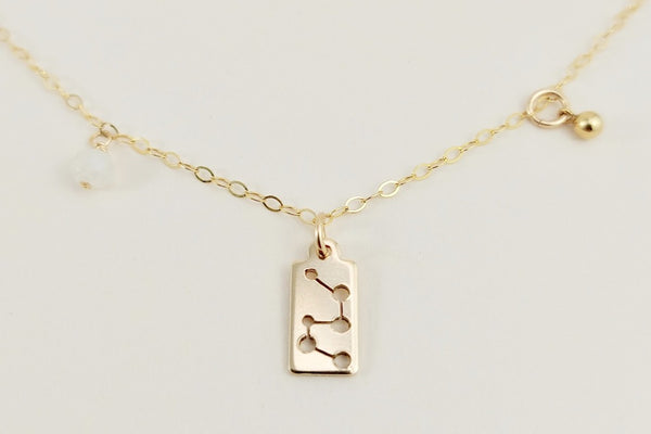The gold scorpio necklace