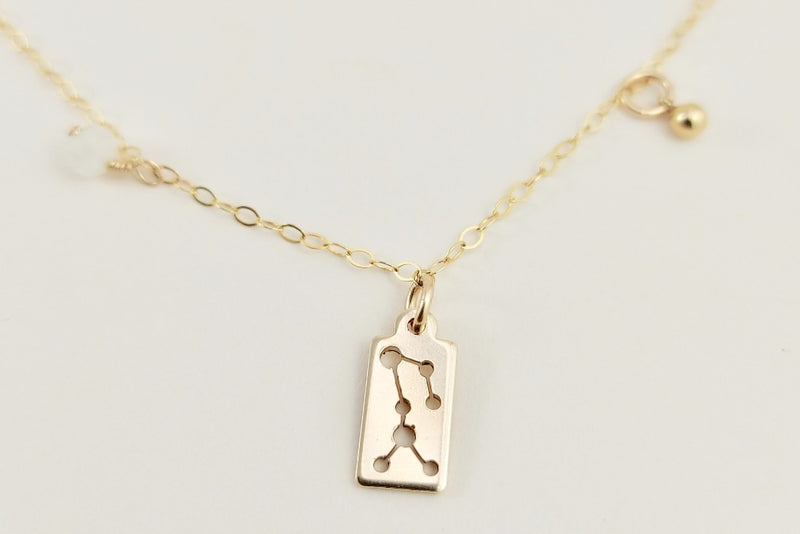 The gold sagittarius necklace