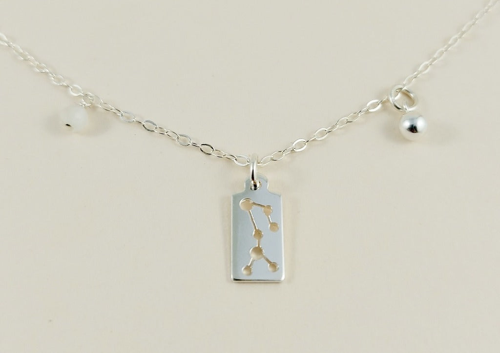 the silver sagittarius necklace