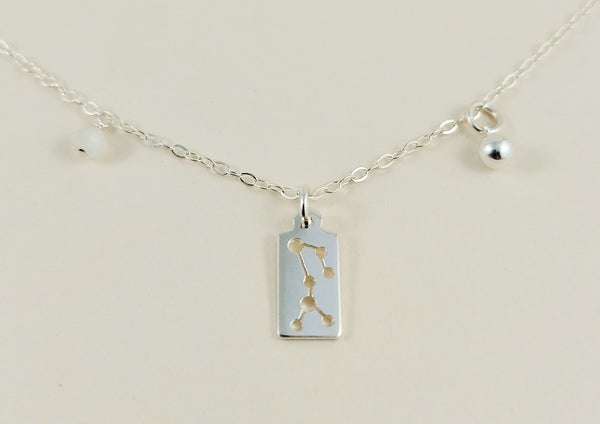 the silver sagittarius necklace